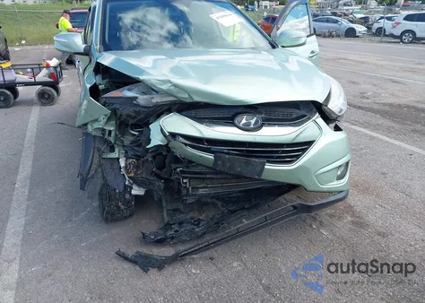 2011 Hyundai Tucson Limited z USA, uszkodzony, nr VIN KM8JU3AC5BU226027